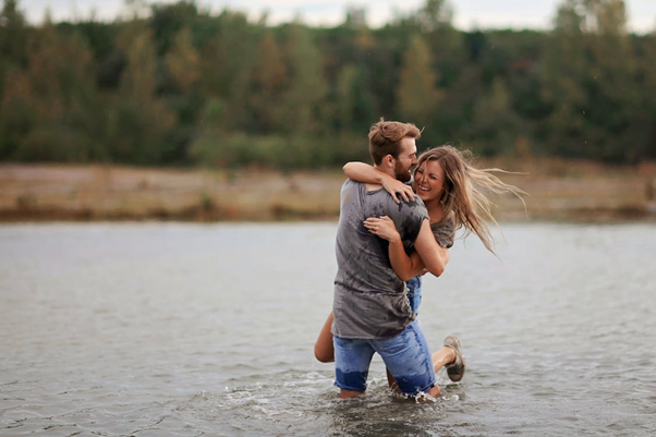 couple hugging in the lake stock pexels