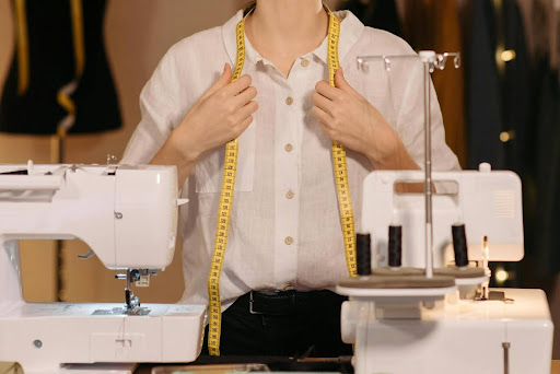 pexels stock image, lady with  tape measure around her neck